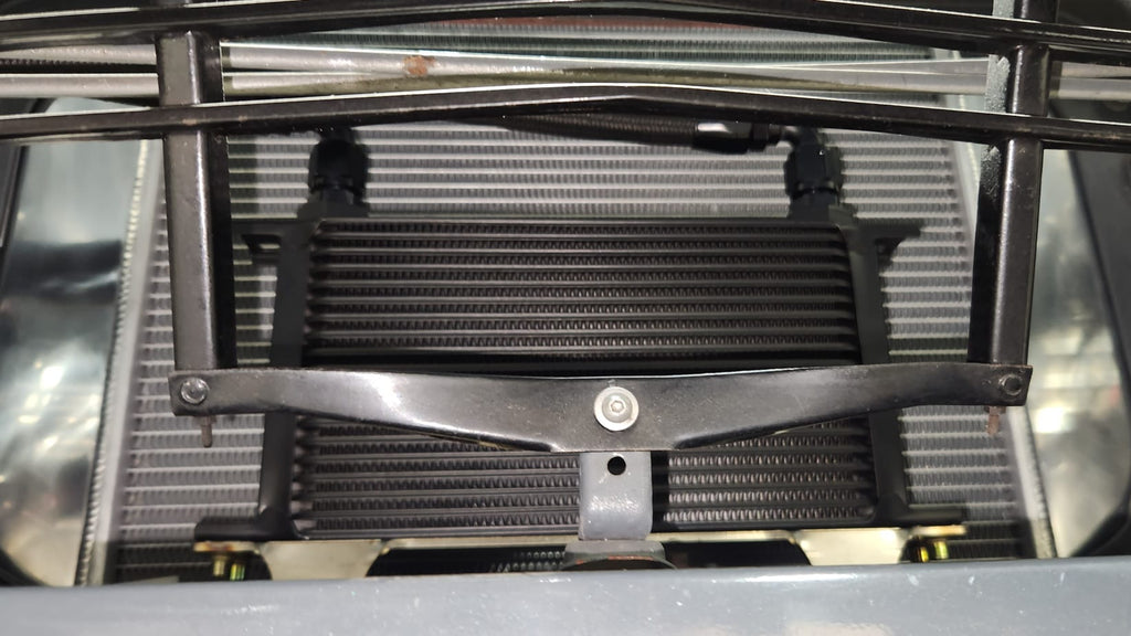 260Z Koyorad oil cooler mount installed in engine bay front view