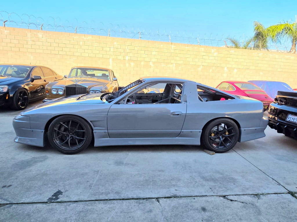 MotoIQ S13 racecar chassis detail stripped interior