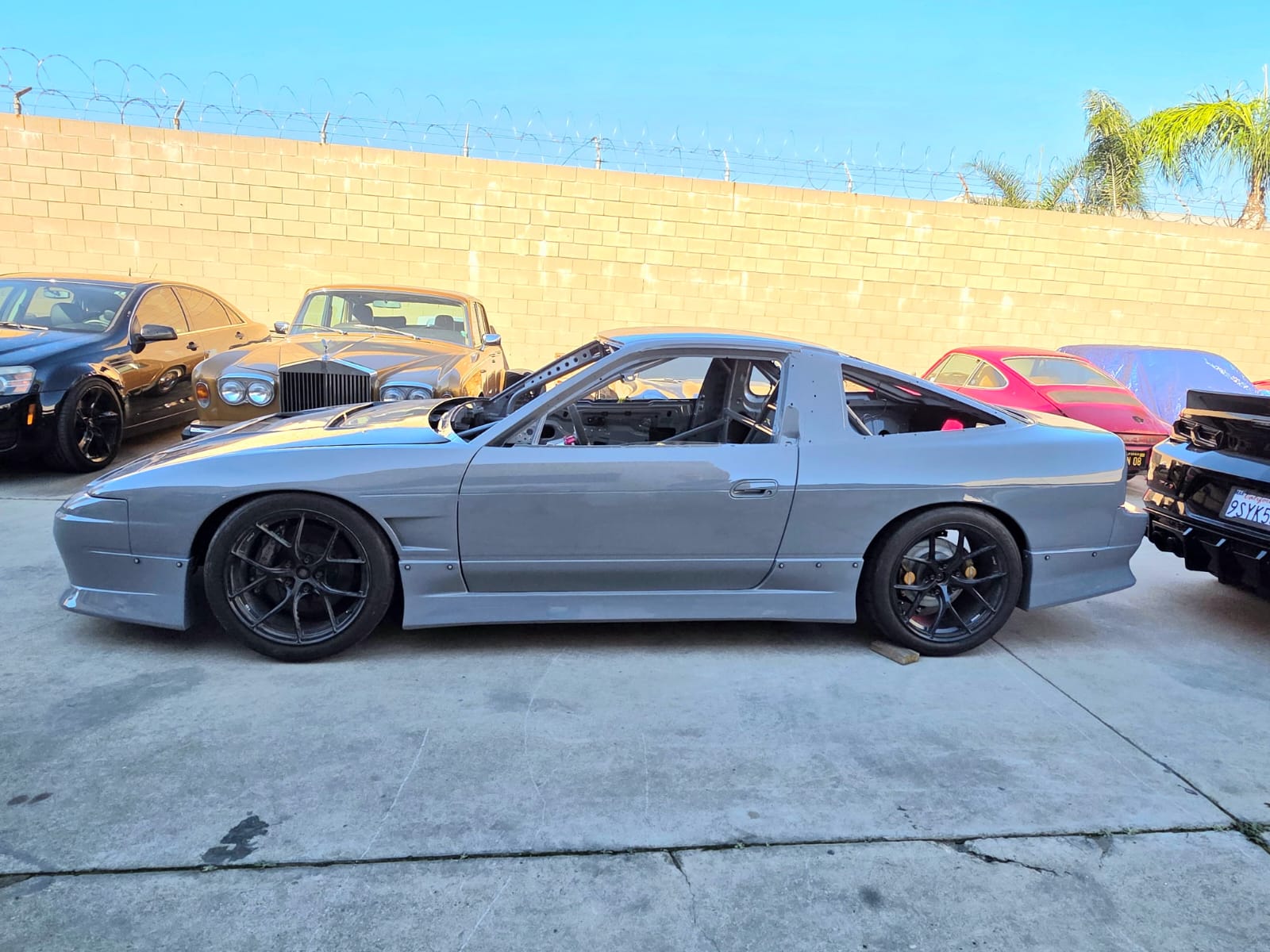 MotoIQ S13 racecar chassis detail stripped interior