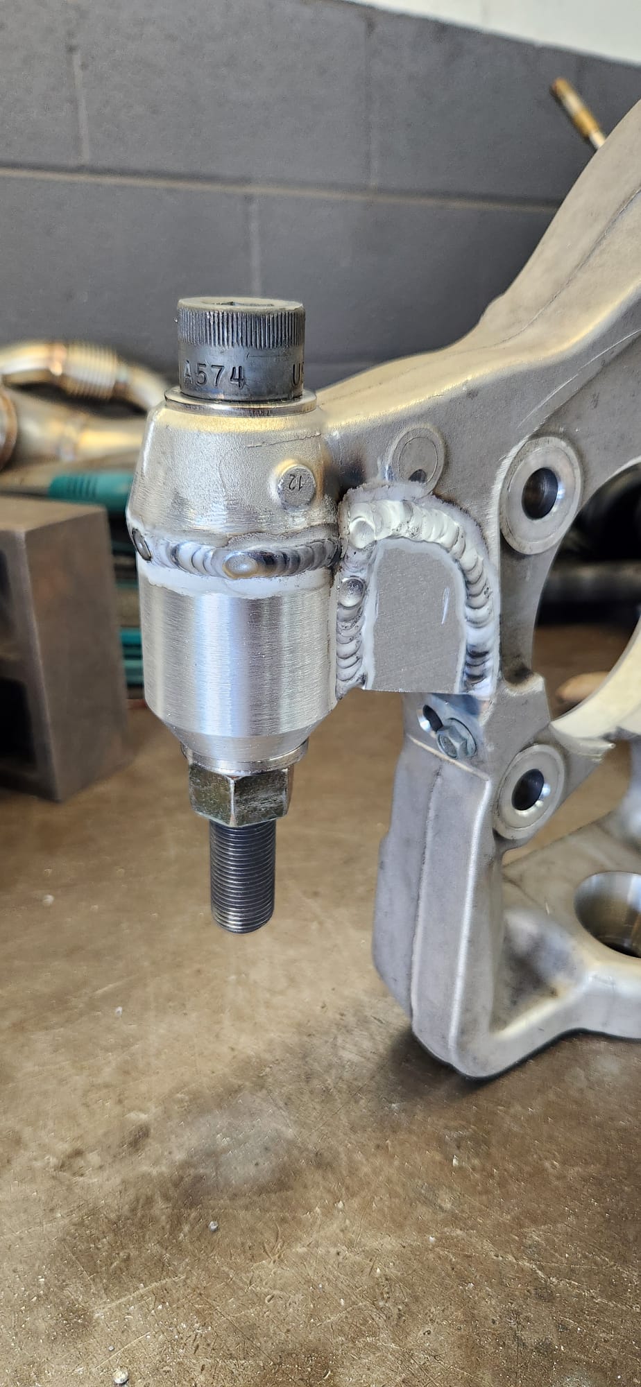 Twin turbo exhaust system low angle showing weld quality and pipe routing