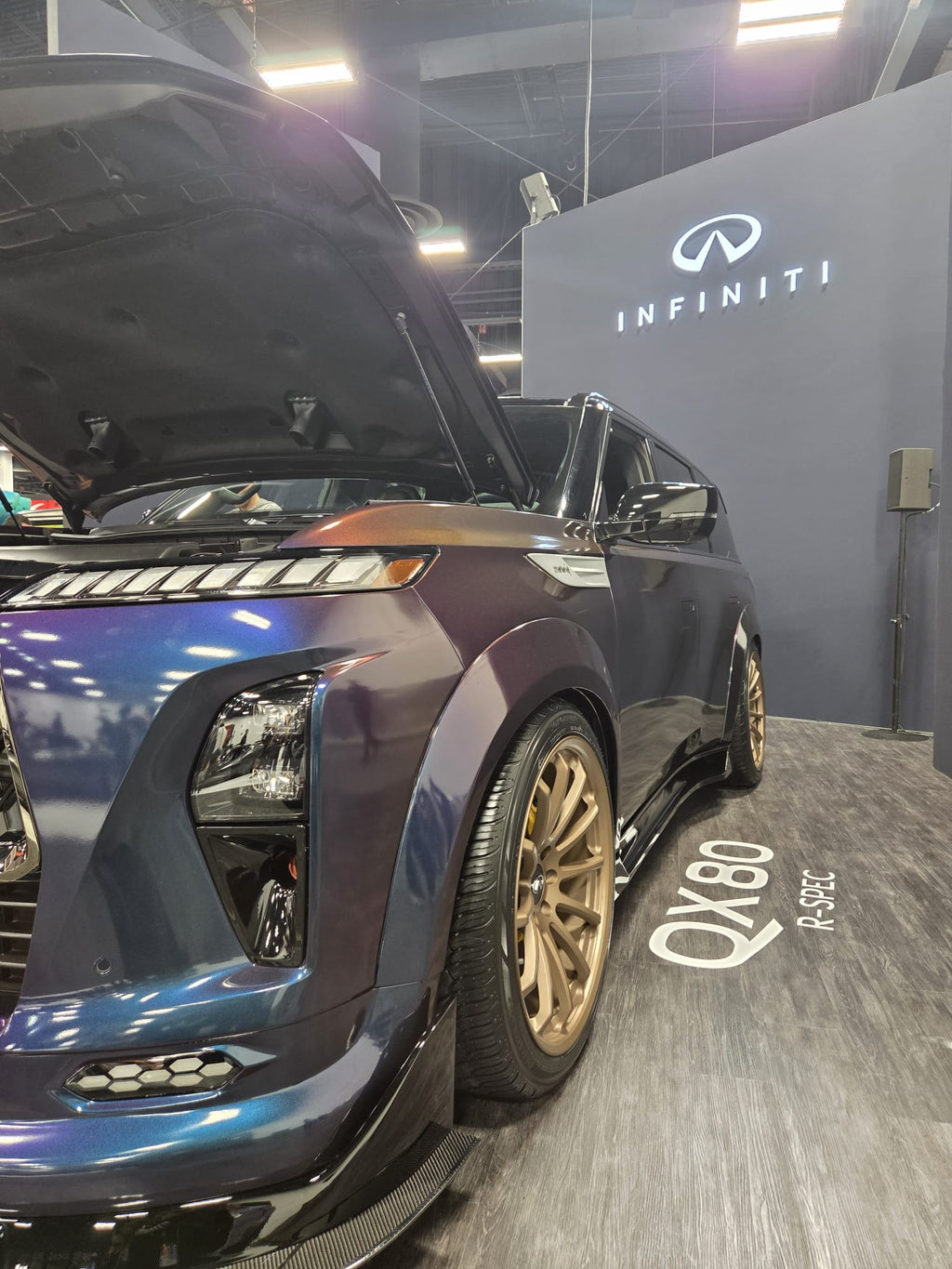 NISMO QX80 R-Spec rear view showing custom quad exhaust and diffuser