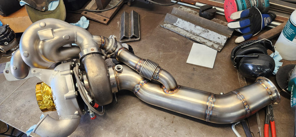 Custom stainless exhaust piping with rainbow heat tint from TIG back-purge welding