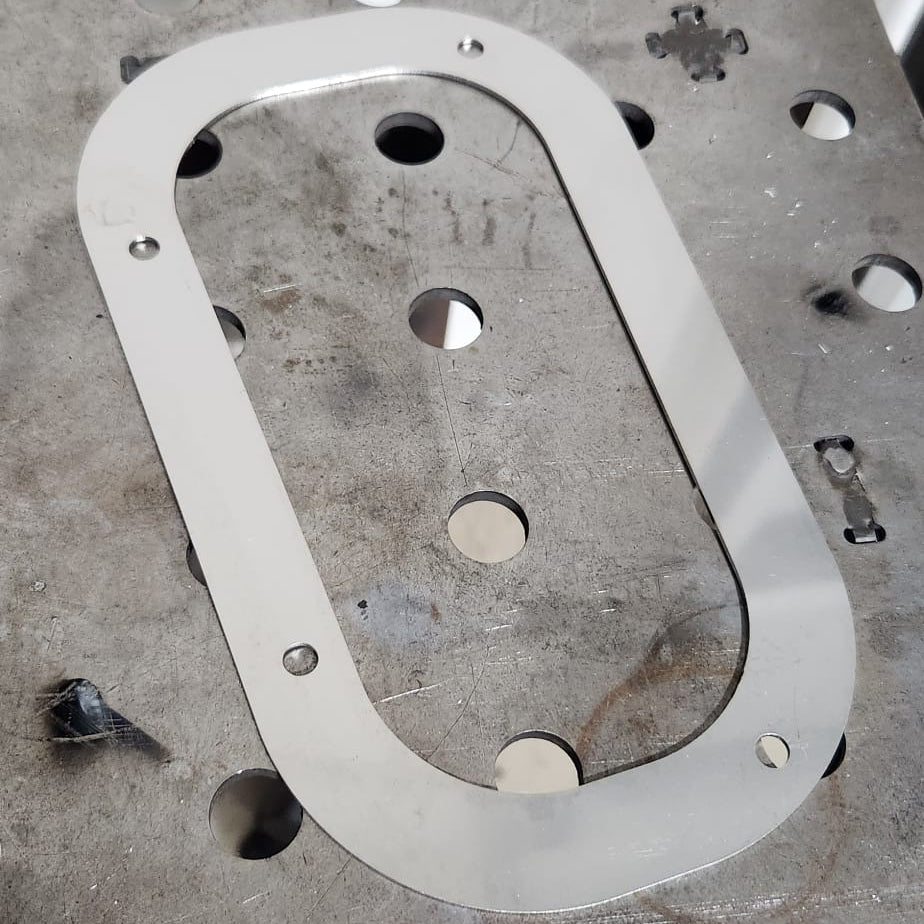 S30Z stainless shift boot ring flat on welding table