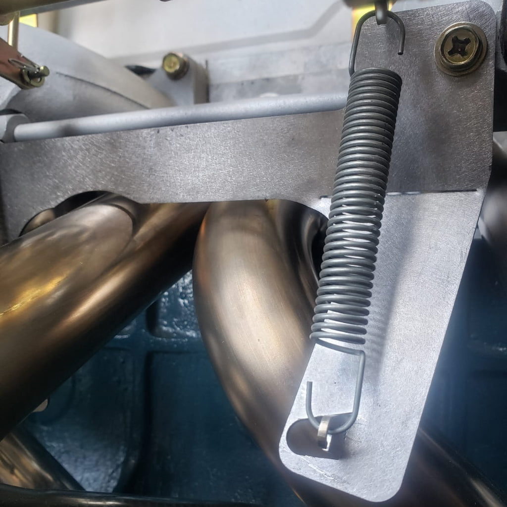 L6 Return Spring Bracket - Mount Under Stock Heatshield