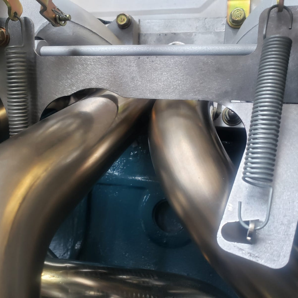 L6 Return Spring Bracket - Mount Under Stock Heatshield