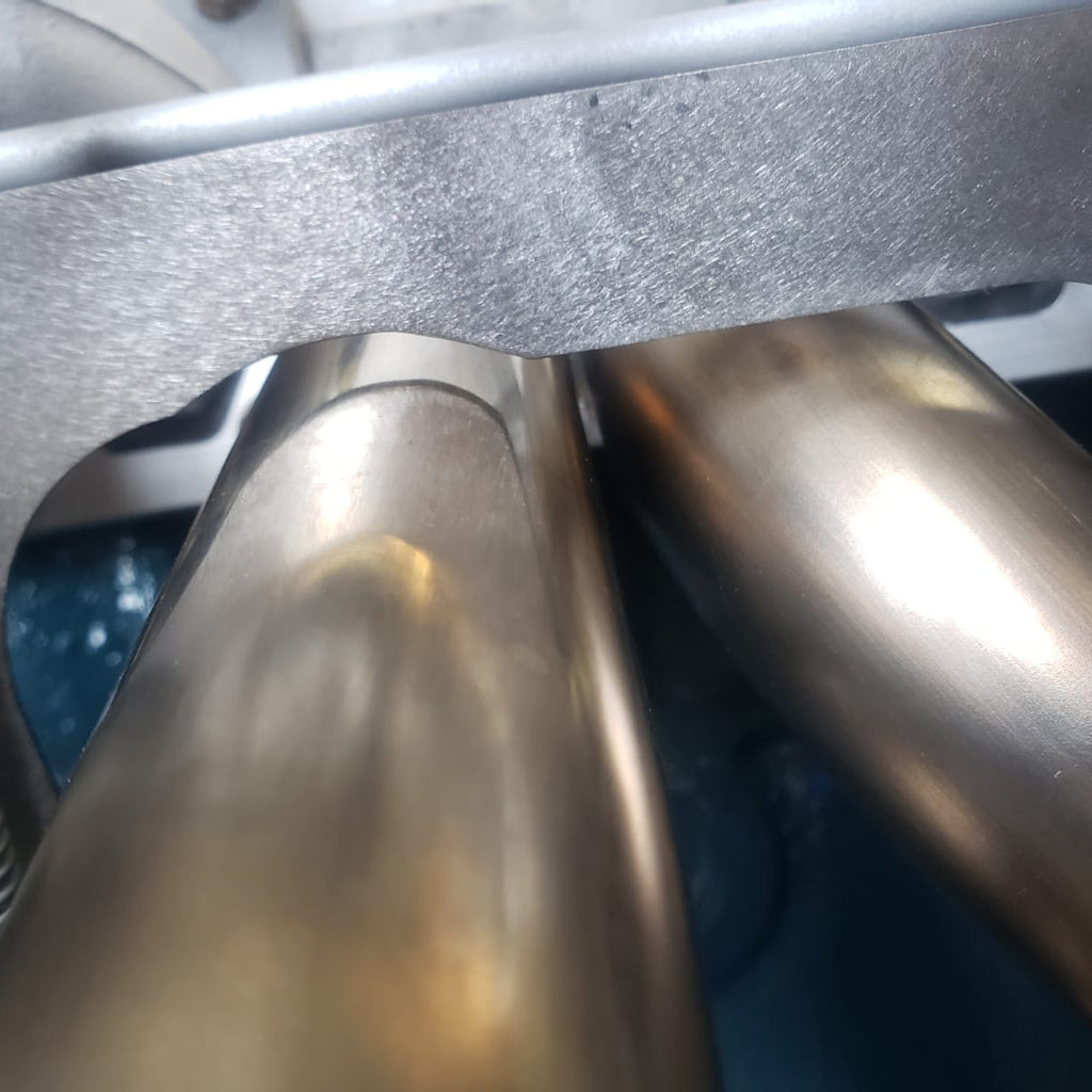 L6 Return Spring Bracket - Mount Under Stock Heatshield