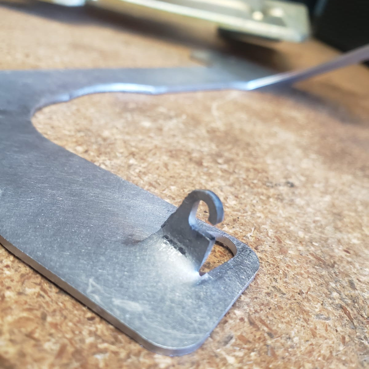 L6 Return Spring Bracket - Mount Under Stock Heatshield