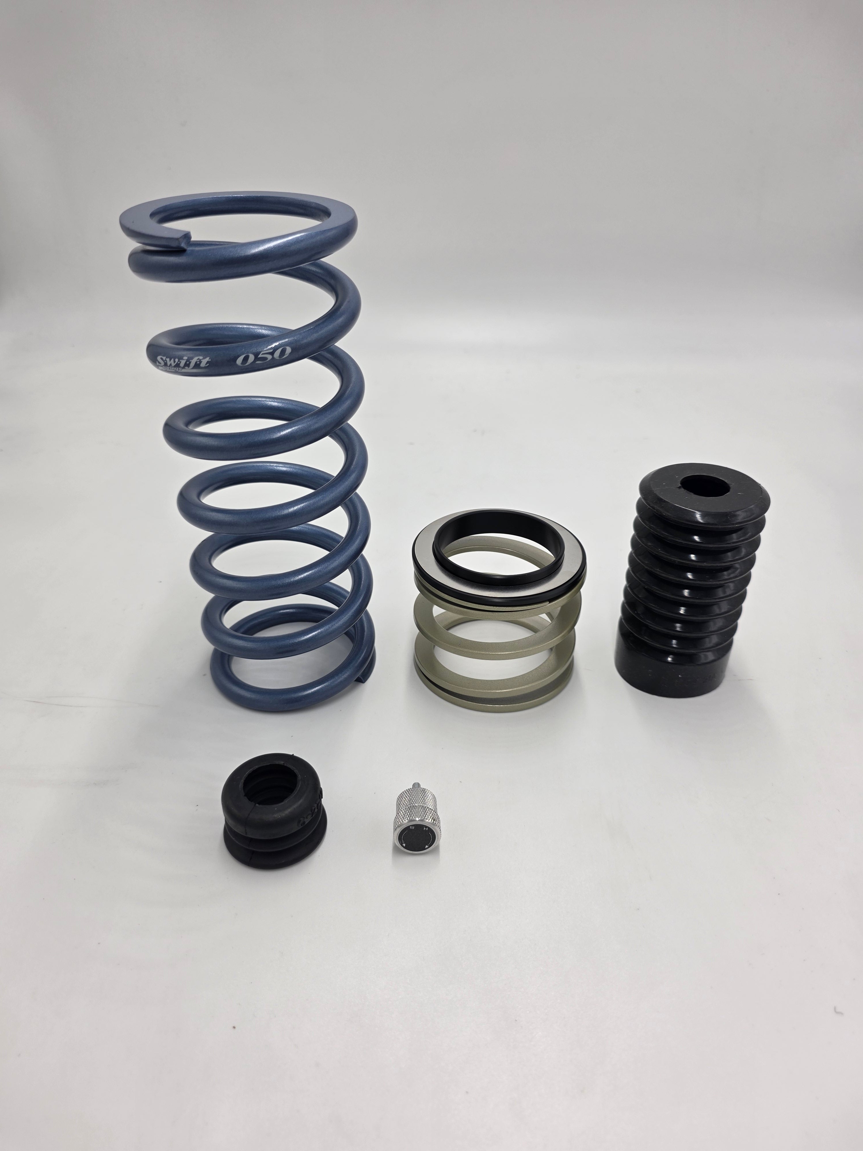 ZSM S30Z coilover components — Swift spring, thrust bearing, bump stop, and hardware