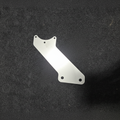 Stainless steel diagonal fuel regulator bracket for Toyota TE37 on black felt