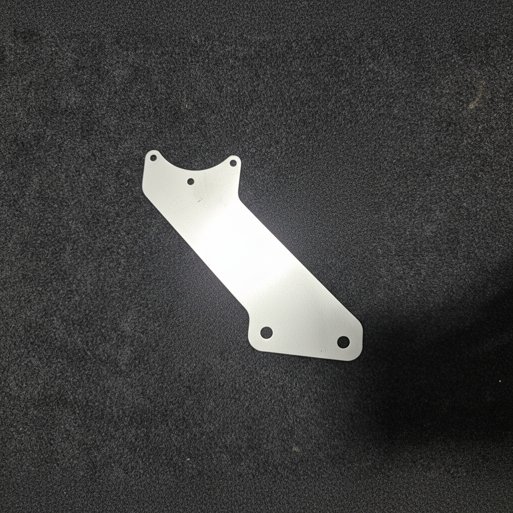 Stainless steel diagonal fuel regulator bracket for Toyota TE37 on black felt