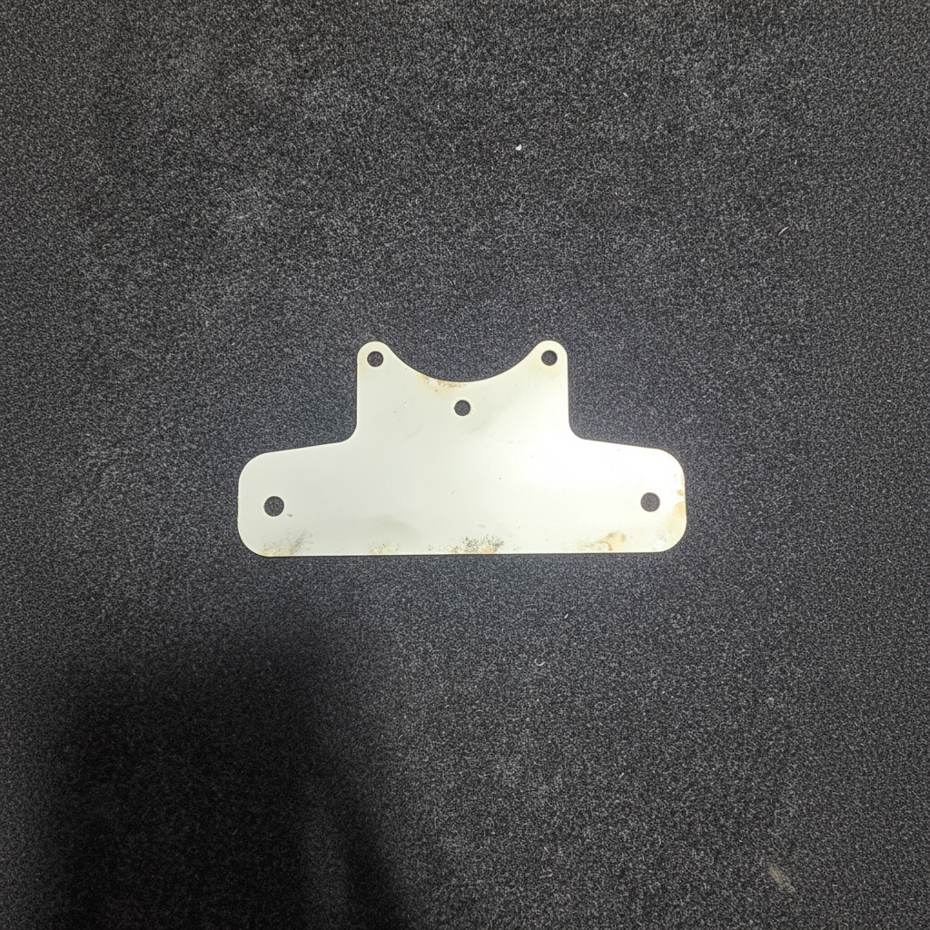 S30Z Number 7 Fuel Regulator Mount on black felt background