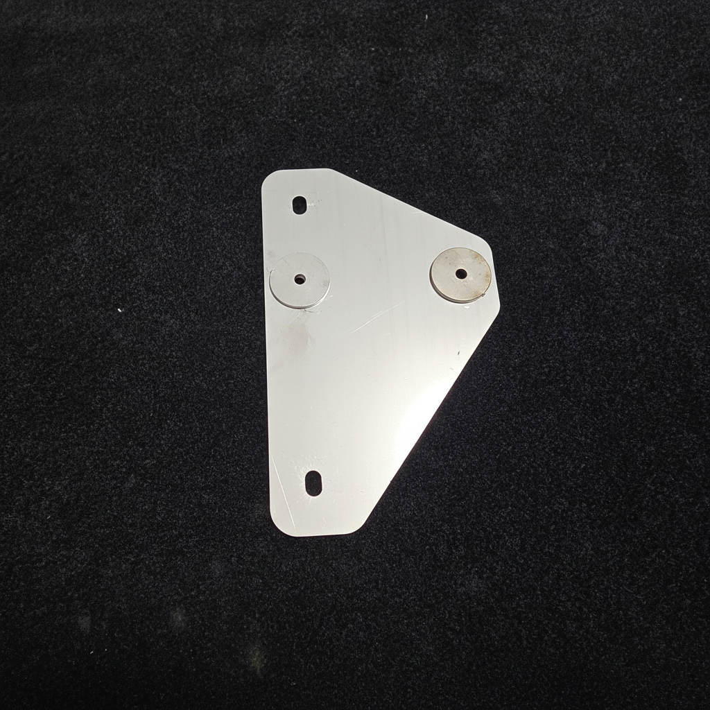 Stainless steel trapezoidal fuel pump bracket for Toyota TE37 on black felt