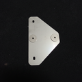 Stainless steel triangular Nismo fuel pump bracket for Toyota TE37 on black felt